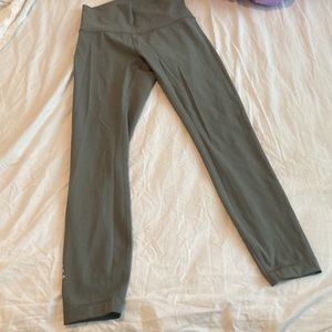 Olive green lululemon. Slight flaw (hole) says Barry’s boot camp sf on it!